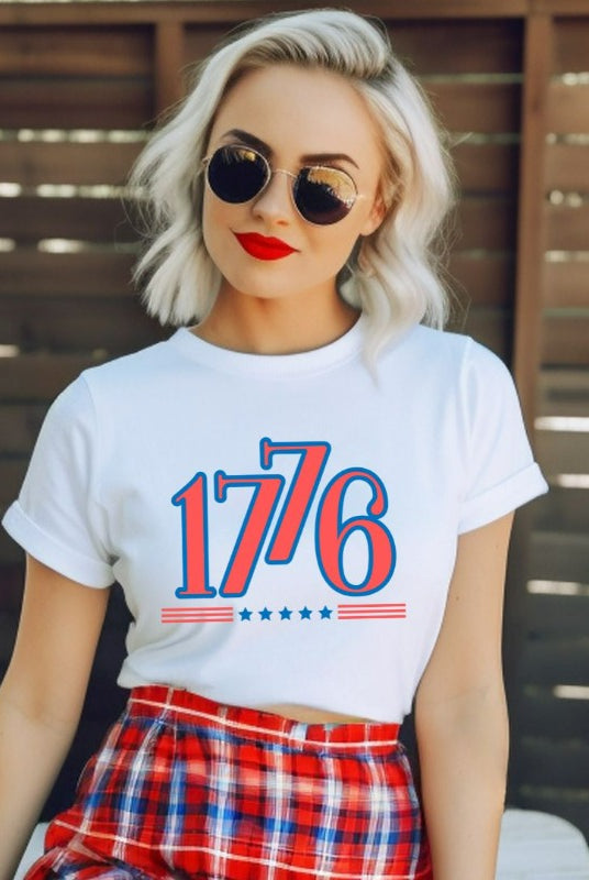 Close-up of a USA July 4th graphic t-shirt with the number '1776' prominently displayed on the front. The shirt features a patriotic design and is perfect for celebrating Independence Day in style on a white graphic t-shirt.