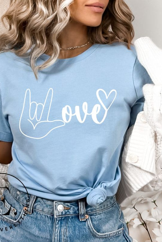 Embrace the power of communication with our downloadable PNG sublimation t-shirt design! Featuring American Sign Language (ASL) hand making the love symbol on a blue shirt. 