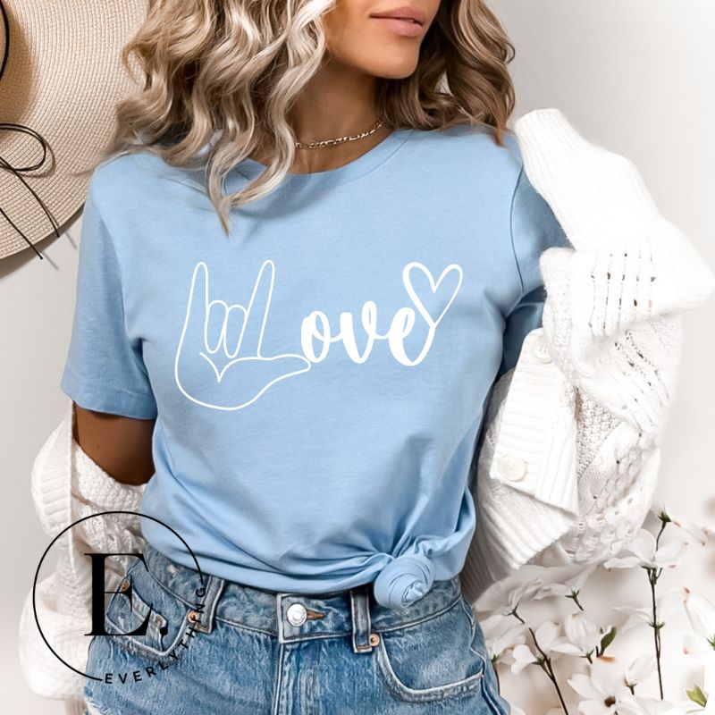 Embrace the power of communication with our downloadable PNG sublimation t-shirt design! Featuring American Sign Language (ASL) hand making the love symbol on a blue shirt. 