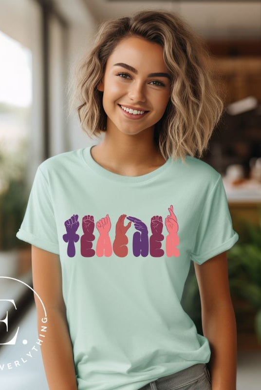 Show appreciation for educators with our downloadable PNG sublimation t-shirt design! Featuring American Sign Language (ASL) hands spelling 'teacher' this design honors the invaluable role of educators on a mint shirt. 
