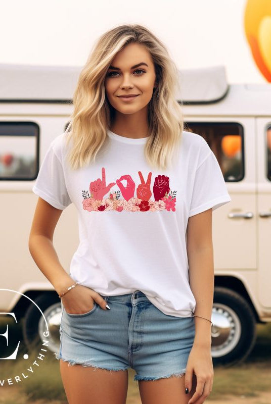 Express love in a unique way with our downloadable PNG sublimation t-shirt design! Featuring American Sign Language (ASL) hands spelling 'Love' adorned with beautiful flowers on a white shirt. 