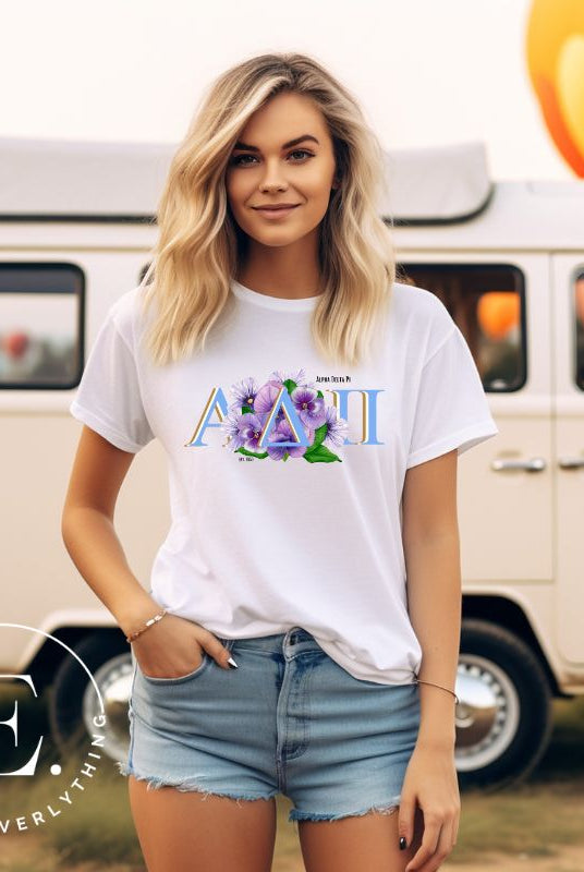 Show your Alpha Delta Pi pride with our stylish t-shirt featuring the sorority letters and the iconic violet, their symbolic flower on a white shirt. 