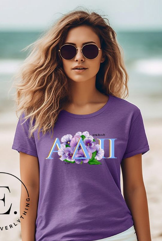 Elevate your Alpha Delta Pi sisterhood with our exclusive sublimation t-shirt download. Featuring the sorority's letters and the timeless violet, their symbolic flower on a purple shirt. 