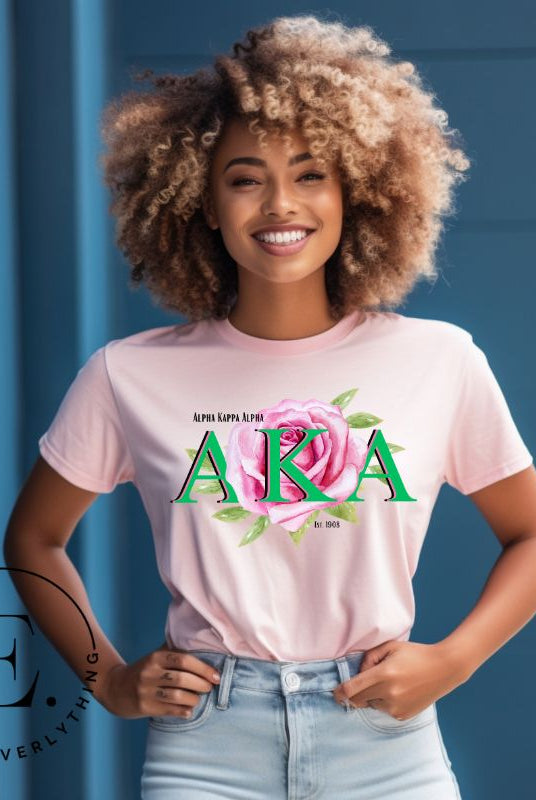 Show off your Kappa Alpha Kappa sisterhood with our stunning t-shirt featuring the sorority letters and the graceful pink tea rose on a pink shirt. 
