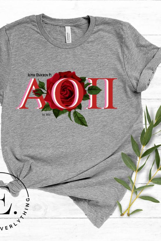 Elevate your Alpha Omicron Pi sisterhood with our premium sublimation t-shirt download. Featuring the sorority's letters and the timeless red rosa, their symbolic flower on a grey shirt. 