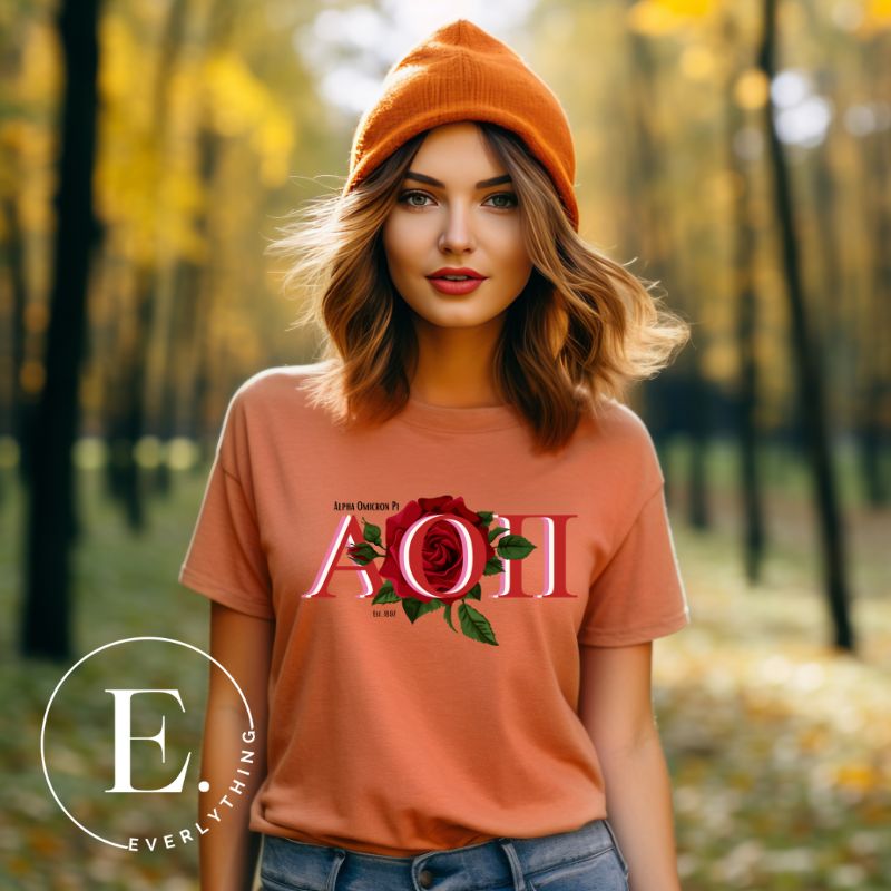 Elevate your Alpha Omicron Pi sisterhood with our premium sublimation t-shirt download. Featuring the sorority's letters and the timeless red rosa, their symbolic flower on a peach shirt. 