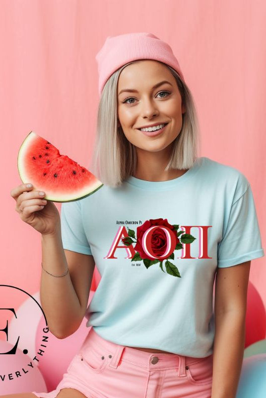 Elevate your Alpha Omicron Pi sisterhood with our premium sublimation t-shirt download. Featuring the sorority's letters and the timeless red rosa, their symbolic flower on an ice blue shirt. 