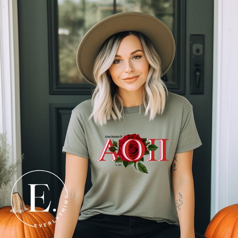 Elevate your Alpha Omicron Pi sisterhood with our premium sublimation t-shirt download. Featuring the sorority's letters and the timeless red rosa, their symbolic flower on an olive green shirt. 