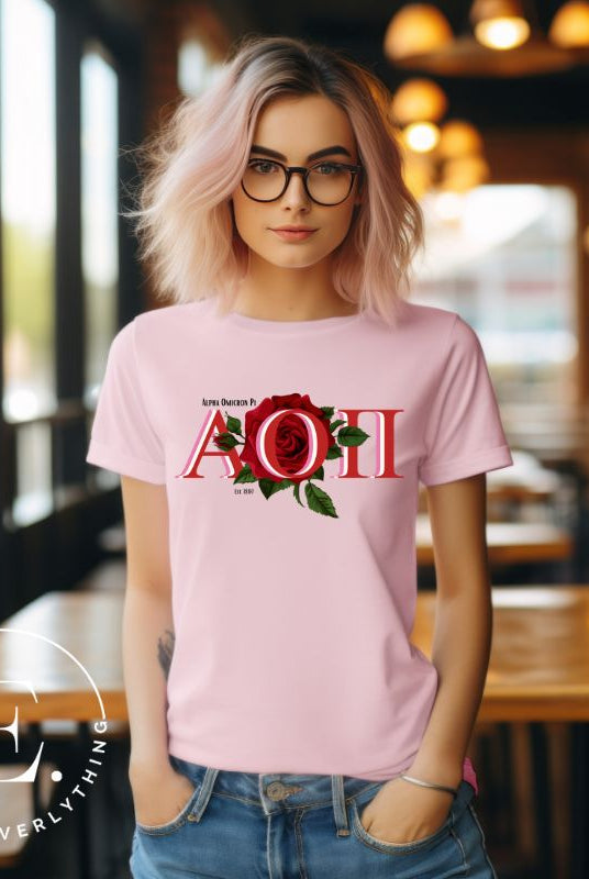 Elevate your Alpha Omicron Pi sisterhood with our premium sublimation t-shirt download. Featuring the sorority's letters and the timeless red rosa, their symbolic flower on a pink shirt. 
