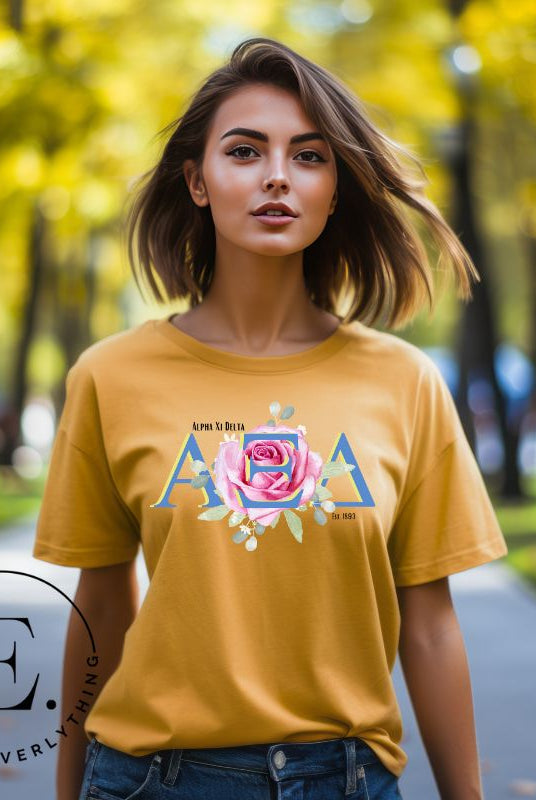 Unleash your Alpha Xi Delta pride with our exclusive sublimation t-shirt download. Featuring the sorority's letters and the beautiful pink rose on a mustard shirt. 