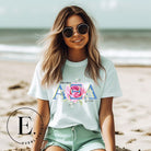 Show your Alpha Xi Delta pride with our stylish t-shirt featuring the sorority's letters and iconic pink rose on a mint shirt. 