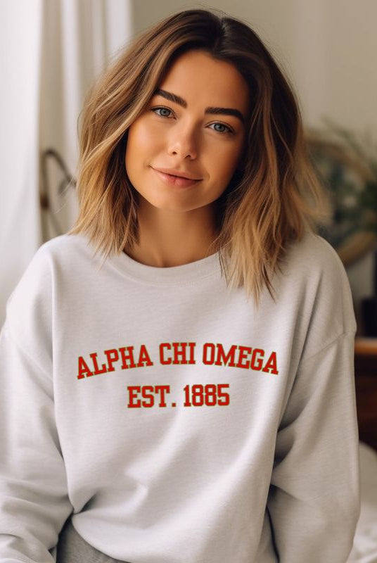 Stay cozy in style with this Alpha Chi Omega Est 1885 pullover sweatshirt - a must-have for any collection of sorority sweatshirts, representing timeless sisterhood pride. White Graphic Sweatshirt