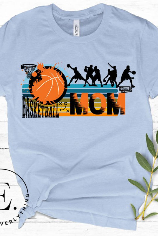 Show off your pride and support for your basketball-playing child with our trendy basketball mom shirt. Designed with love, this shirt is perfect for cheering on your little baller. Stay comfortable and stylish while showcasing your team spirit. Get yours today and rock the sidelines like a proud basketball mom. on alight blue shirt. 