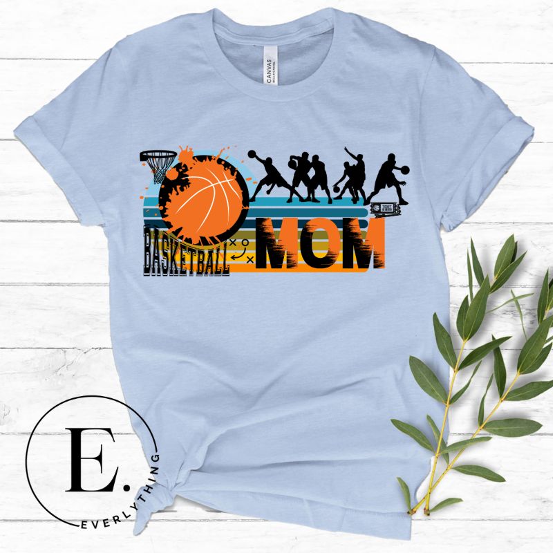 Show off your pride and support for your basketball-playing child with our trendy basketball mom shirt. Designed with love, this shirt is perfect for cheering on your little baller. Stay comfortable and stylish while showcasing your team spirit. Get yours today and rock the sidelines like a proud basketball mom. on alight blue shirt. 