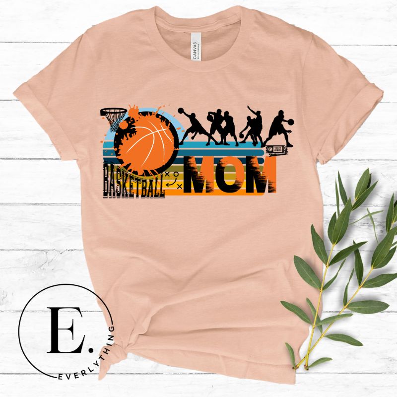 Elevate your basketball mom style with our PNG sublimation download. Create a personalized basketball mom shirt that showcases your unwavering support. PNG example on a peach shirt. 