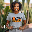 Show off your pride and support for your basketball-playing child with our trendy basketball mom shirt. Designed with love, this shirt is perfect for cheering on your little baller. Stay comfortable and stylish while showcasing your team spirit. Get yours today and rock the sidelines like a proud basketball mom on an athletic heather grey shirt. 