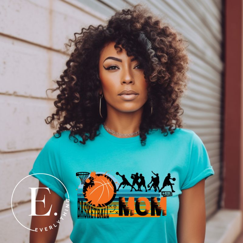 Elevate your basketball mom style with our PNG sublimation download. Create a personalized basketball mom shirt that showcases your unwavering support. PNG example on a teal shirt. 