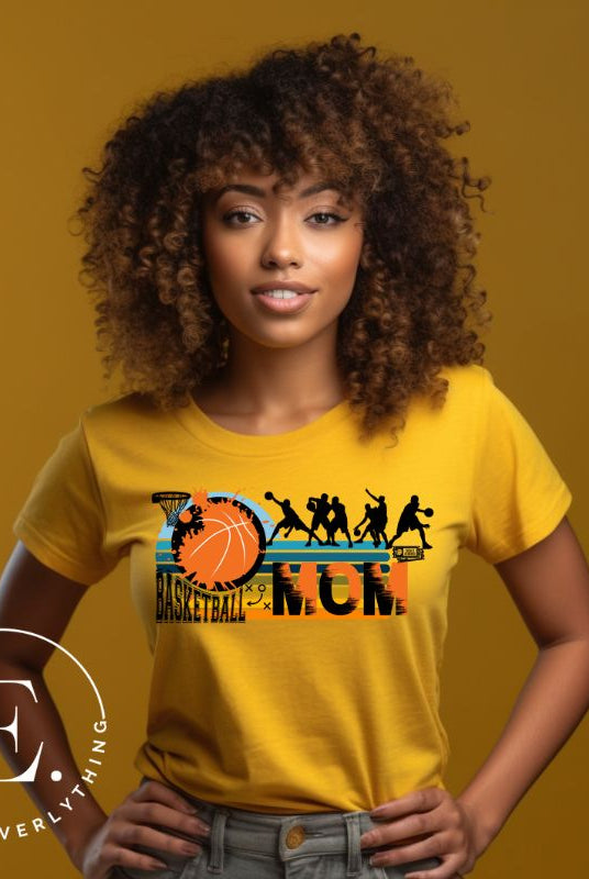 Show off your pride and support for your basketball-playing child with our trendy basketball mom shirt. Designed with love, this shirt is perfect for cheering on your little baller. Stay comfortable and stylish while showcasing your team spirit. Get yours today and rock the sidelines like a proud basketball mom. on a yellow shirt. 