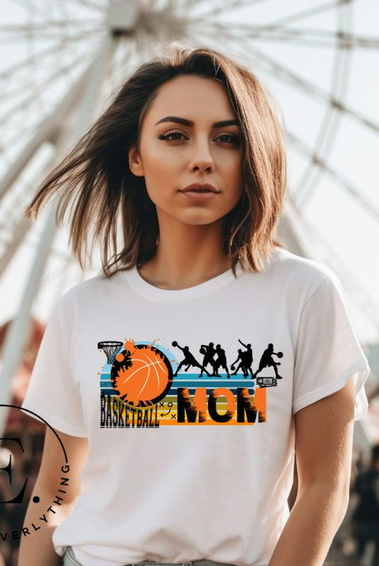 Show off your pride and support for your basketball-playing child with our trendy basketball mom shirt. Designed with love, this shirt is perfect for cheering on your little baller. Stay comfortable and stylish while showcasing your team spirit. Get yours today and rock the sidelines like a proud basketball mom on a white shirt. 
