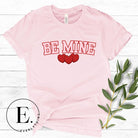 Make your Valentine's Day celebrations even more special with our PNG sublimation digital download! You can create unique and personalized shirts featuring the charming phrase "Be Mine" in a trendy and eye-catching design. Example on Be Mine PNG sublimation on a pink shirt. 