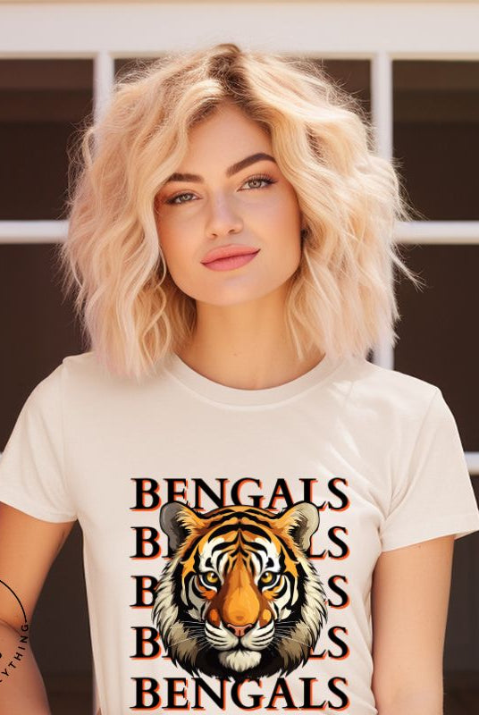 Our exclusive design features a fierce Siberian tiger face and the spirited mantra "Bengals Bengals Bengals Bengals." Unleash your inner roar with our comfortable Bella Canvas 3001 unisex graphic tee and show your stripes as a Cincinnati Bengals fan on a soft cream shirt. 