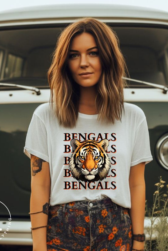 Our exclusive design features a fierce Siberian tiger face and the spirited mantra "Bengals Bengals Bengals Bengals." Unleash your inner roar with our comfortable Bella Canvas 3001 unisex graphic tee and show your stripes as a Cincinnati Bengals fan on a white shirt. 