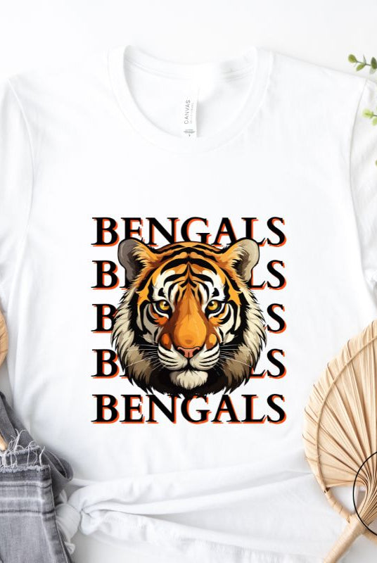Our exclusive design features a fierce Siberian tiger face and the spirited mantra "Bengals Bengals Bengals Bengals." Unleash your inner roar with our comfortable Bella Canvas 3001 unisex graphic tee and show your stripes as a Cincinnati Bengals fan on a white shirt. 