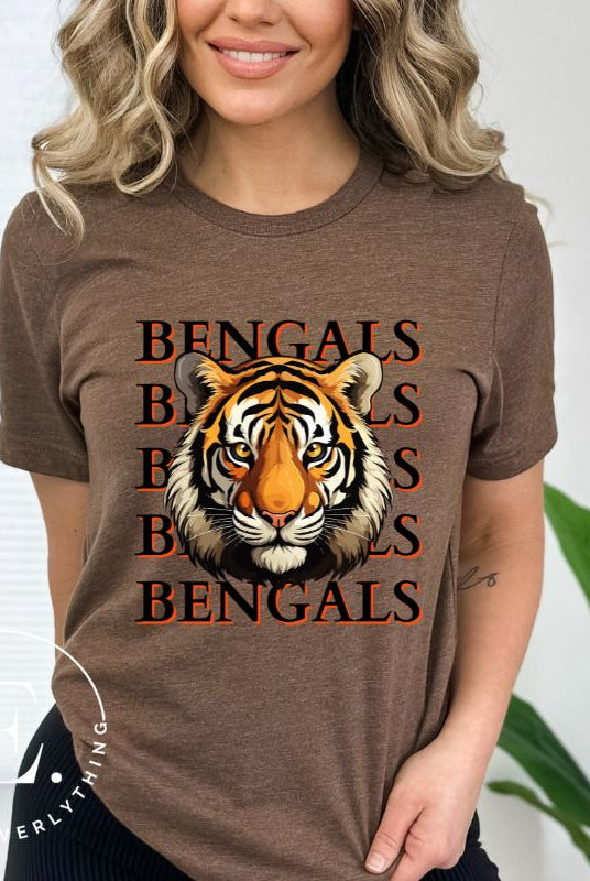 Our exclusive design features a fierce Siberian tiger face and the spirited mantra "Bengals Bengals Bengals Bengals." Unleash your inner roar with our comfortable Bella Canvas 3001 unisex graphic tee and show your stripes as a Cincinnati Bengals fan on a brown shirt. 