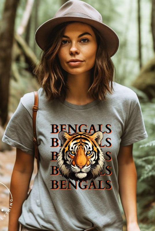 Our exclusive design features a fierce Siberian tiger face and the spirited mantra "Bengals Bengals Bengals Bengals." Unleash your inner roar with our comfortable Bella Canvas 3001 unisex graphic tee and show your stripes as a Cincinnati Bengals fan on a grey shirt. 