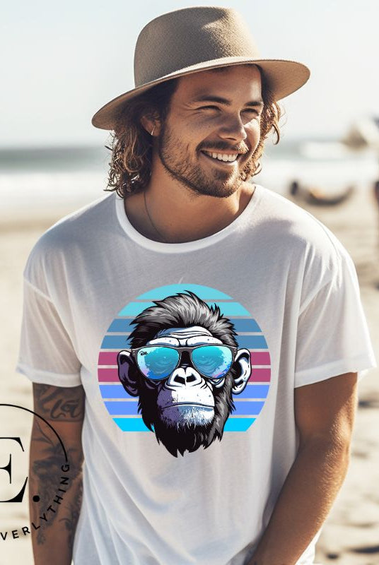 Hyper-realistic gorilla wearing sunglasses with a retro blue horizon behind on a white colored shirt.