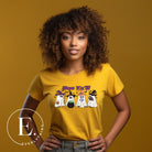 Get into the Halloween spirit with our adorable PNG sublimation download. Four cute ghost going trick-or-treating, accompanied by the playful saying 'Boo Ya'll.' PNG example on a yellow shirt. 