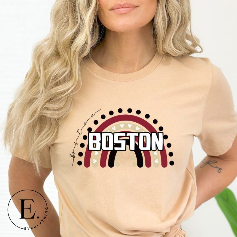 Show off your pride with this Boston College t-shirt. The iconic BC school colors stands out in this modern and trendy rainbow background, representing the school spirit. With the classic Boston wordmark across the rainbow on cream shirt. 