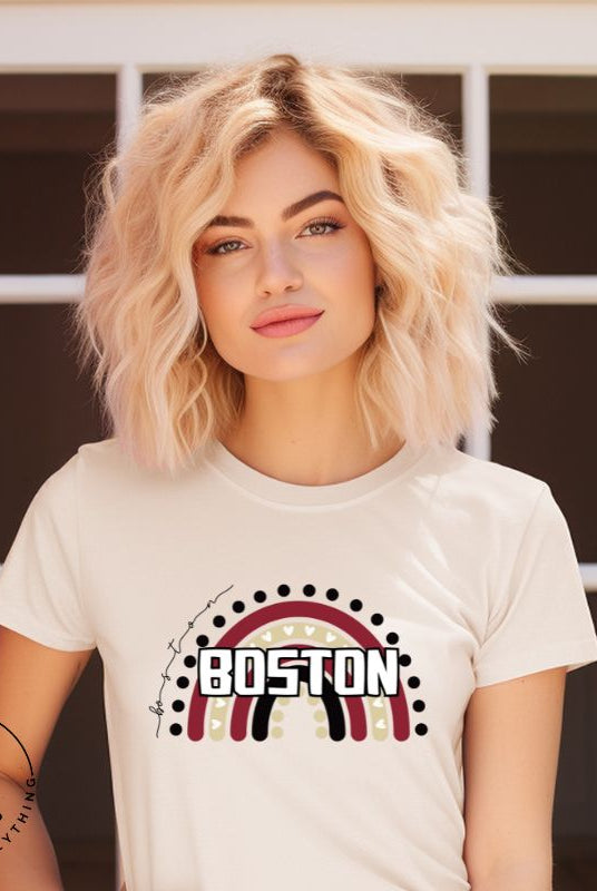 Show off your pride with this Boston College t-shirt. The iconic BC school colors stands out in this modern and trendy rainbow background, representing the school spirit. With the classic Boston wordmark across the rainbow on a soft cream shirt.