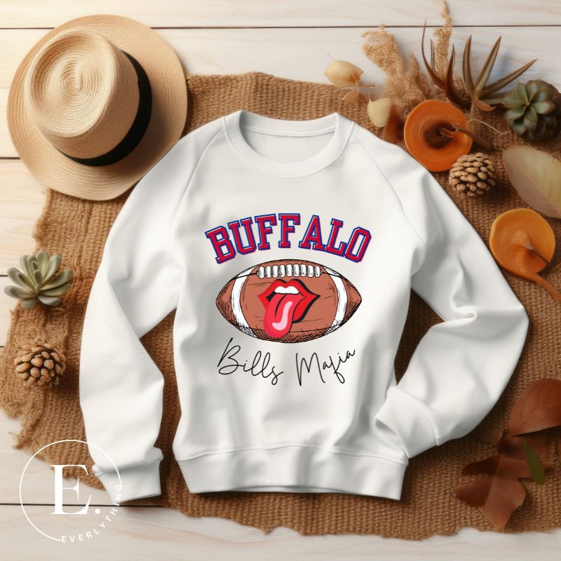 Show your Buffalo Bills pride with our premium sweatshirt featuring the team's name and iconic slogan, "Bills Mafia." On a white sweatshirt. 