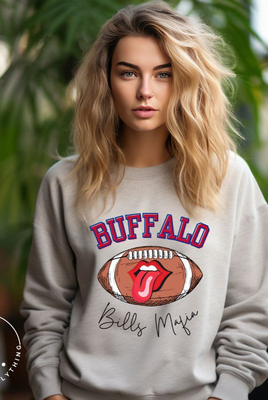 Show your Buffalo Bills pride with our premium sweatshirt featuring the team's name and iconic slogan, "Bills Mafia." ON a grey sweatshirt. 