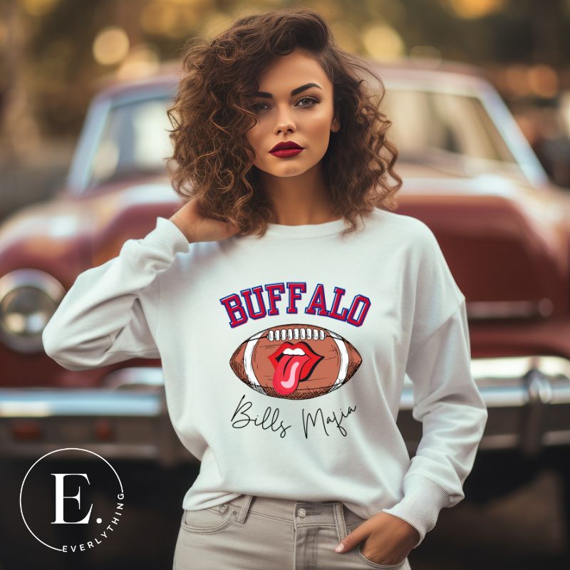 Show your Buffalo Bills pride with our premium sweatshirt featuring the team's name and iconic slogan, "Bills Mafia." On a white sweatshirt. 