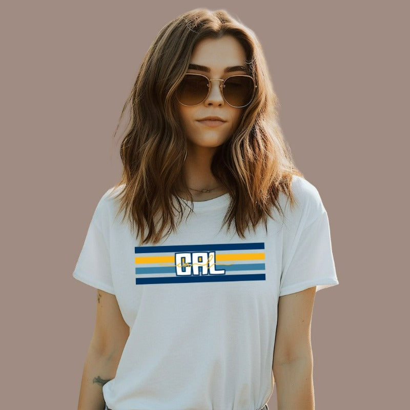 Bella + Canvas 3001 unisex t-shirt featuring blue and gold horizontal stripes with "CAL" text prominently displayed in the center on a white graphic tee.