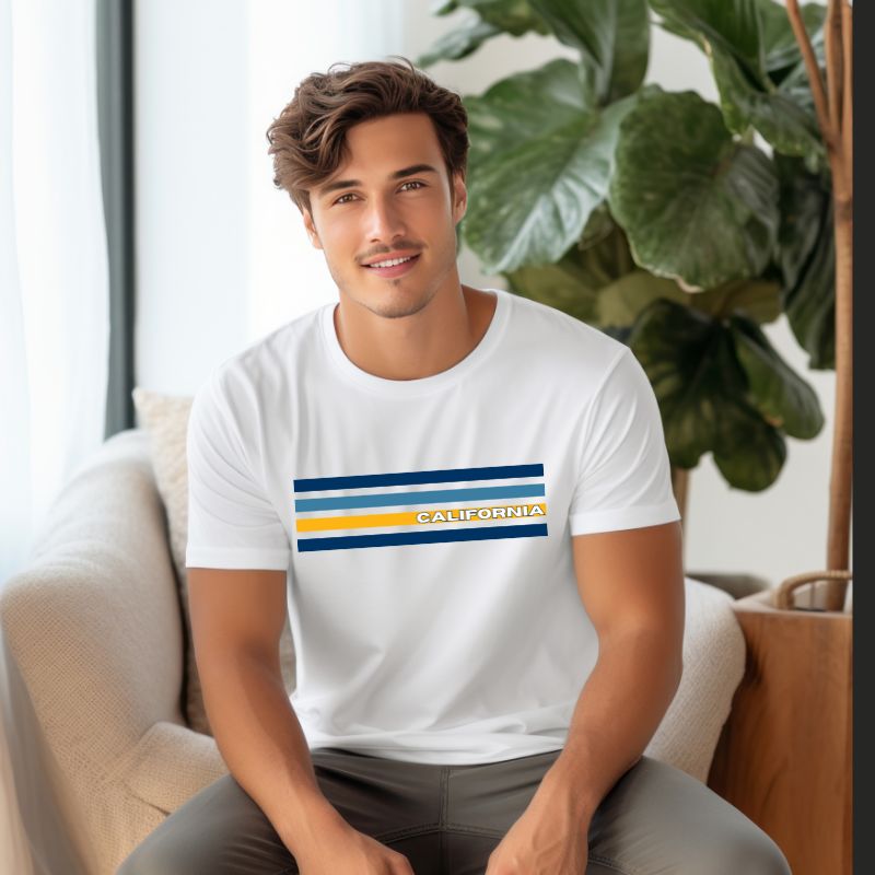 Bella + Canvas 3001 unisex t-shirt featuring bold blue and gold horizontal stripes with the word "CALIFORNIA" prominently displayed in the center on a awhite shirt