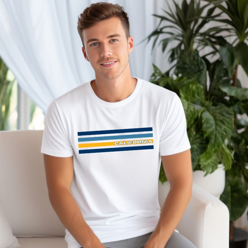 Bella + Canvas 3001 unisex t-shirt featuring bold blue and gold horizontal stripes with the word "CALIFORNIA" prominently displayed in the center on a white shirt