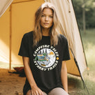 Black Bella + Canvas 3001 unisex t-shirt with a summer camping graphic design featuring a tent, campfire, and starry sky with the words 'Campfire Tales, Starry Trails' around the image.