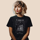 Bella + Canvas 3001 black heather Cancer Zodiac shirt featuring an intricate Cancer symbol design, constellation, and dates June 21 - July 22.