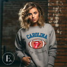 Support the Carolina Panthers in style with our modern and trendy sweatshirt featuring the team's name and powerful teams slogan, "Keep Pounding." On a grey sweatshirt. 