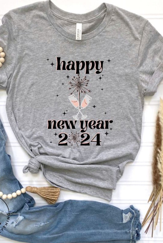 Welcome 2024 in sparkling style with our 'Happy New Year 2024' shirt. Adorned with two clinking champagne glasses amidst fireworks on a grey shirt. 