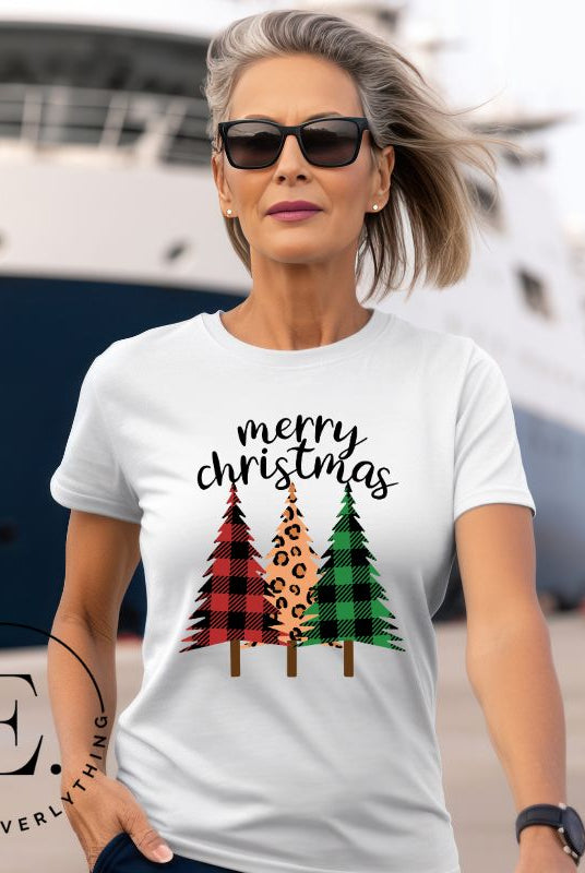 Get ready to unleash your wild side this Christmas with our unique shirt. This design is a bold and playful take on the holiday season, featuring three Christmas trees adorned with fierce cheetah print on a white shirt. 