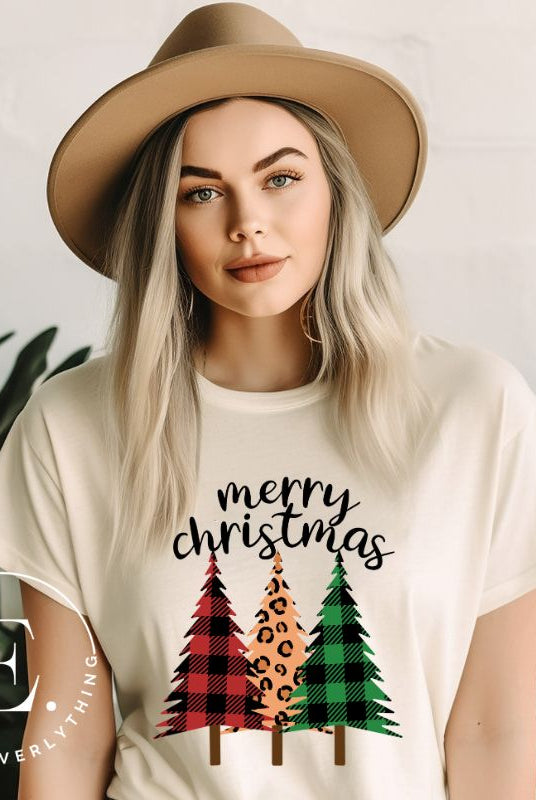 Get ready to unleash your wild side this Christmas with our unique shirt. This design is a bold and playful take on the holiday season, featuring three Christmas trees adorned with fierce cheetah print on a soft cream shirt. 