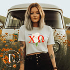 Show off your Chi Omega spirit with our stunning sorority t-shirt design! This shirt is designed with the sorority letters and a beautiful white carnation on a white shirt. 