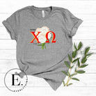 Show off your Chi Omega spirit with our stunning sorority t-shirt design! This shirt is designed with the sorority letters and a beautiful white carnation on a grey shirt. 