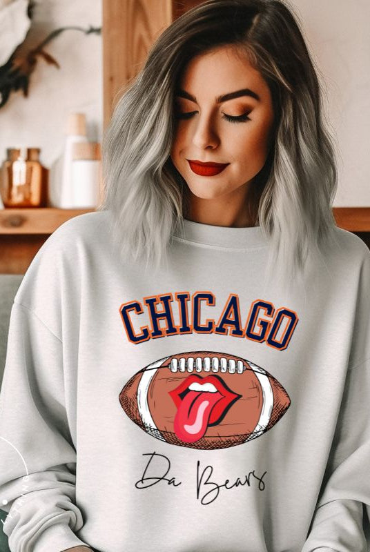 Embrace your Chicago Bears pride with our exclusive sweatshirt featuring the team's name and iconic slogan, "Da Bears." On a grey sweatshirt. 