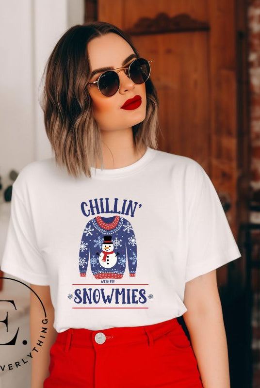 Get into the holiday spirit with our adorable Christmas sweater featuring a snowman and the playful phrase "Chillin' with my Snowmies" on white colored shirt.