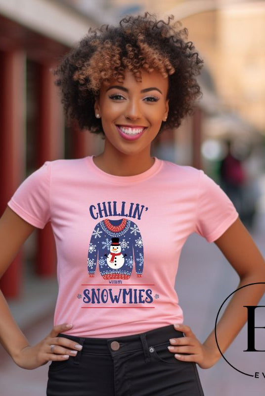 Get into the holiday spirit with our adorable Christmas sweater featuring a snowman and the playful phrase "Chillin' with my Snowmies" on pink colored shirt.